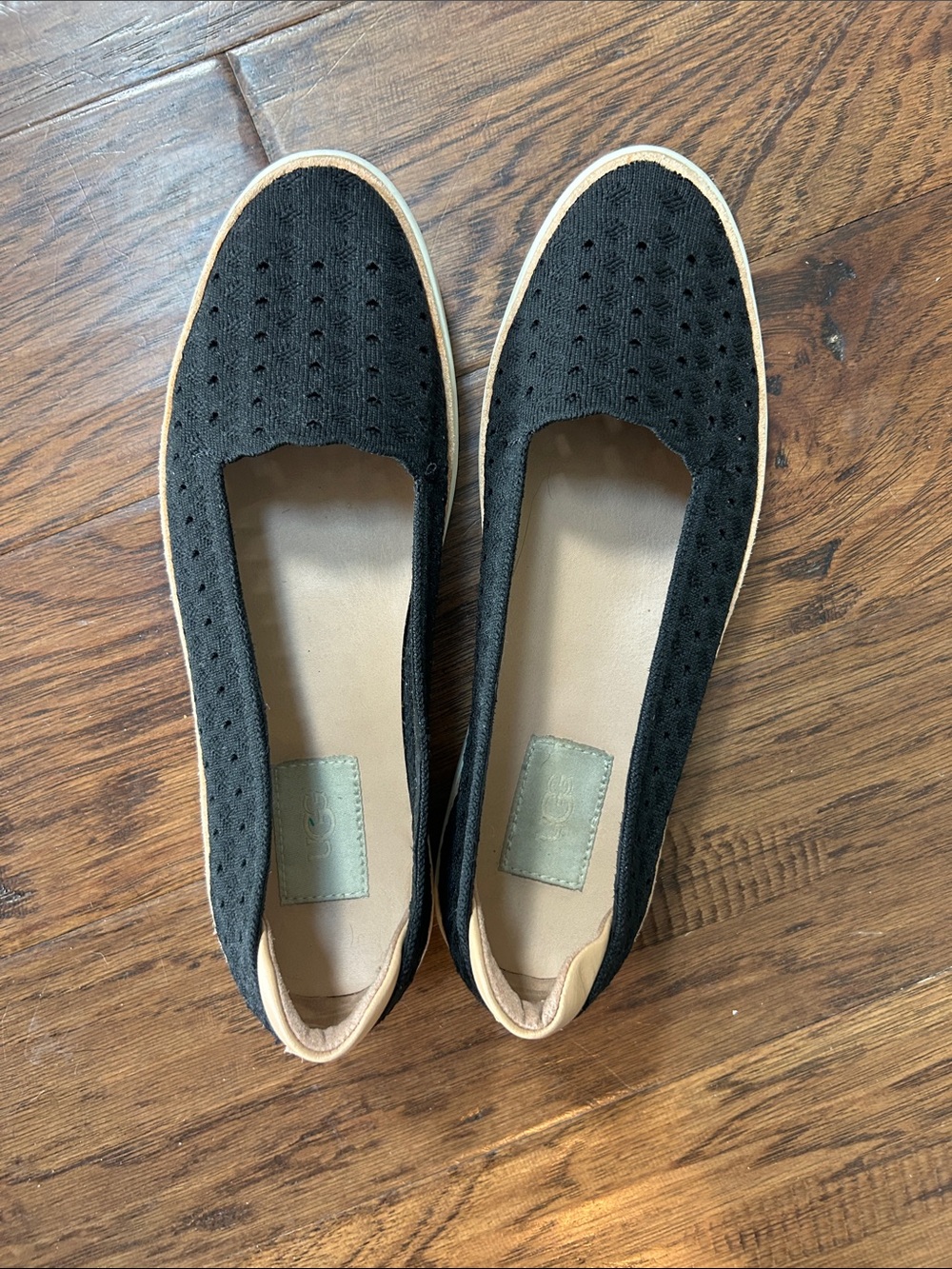 UGG Black Perforated Slip-On Flats with Tan Trim